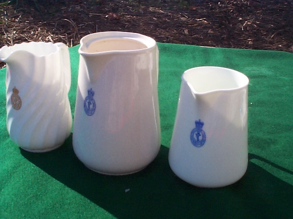 various British royal navy cream and milk pitchers ca 1950s 1960s