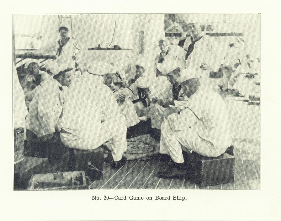 photograph of sailors aboard ship playing dice games while sitting on their ditty boxes ca 1890s Spanish American War to early 1900s Great White Fleet