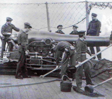 sailor on deck part of gun crew wearing the m1860 during the Civil War